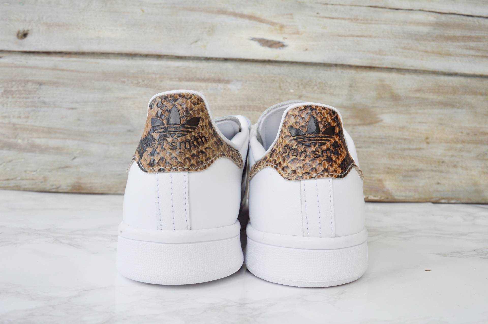 stan smith snake scratch