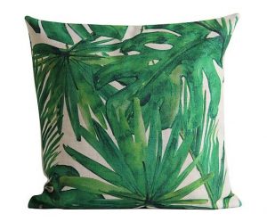 coussin imprimé feuilles tropicales